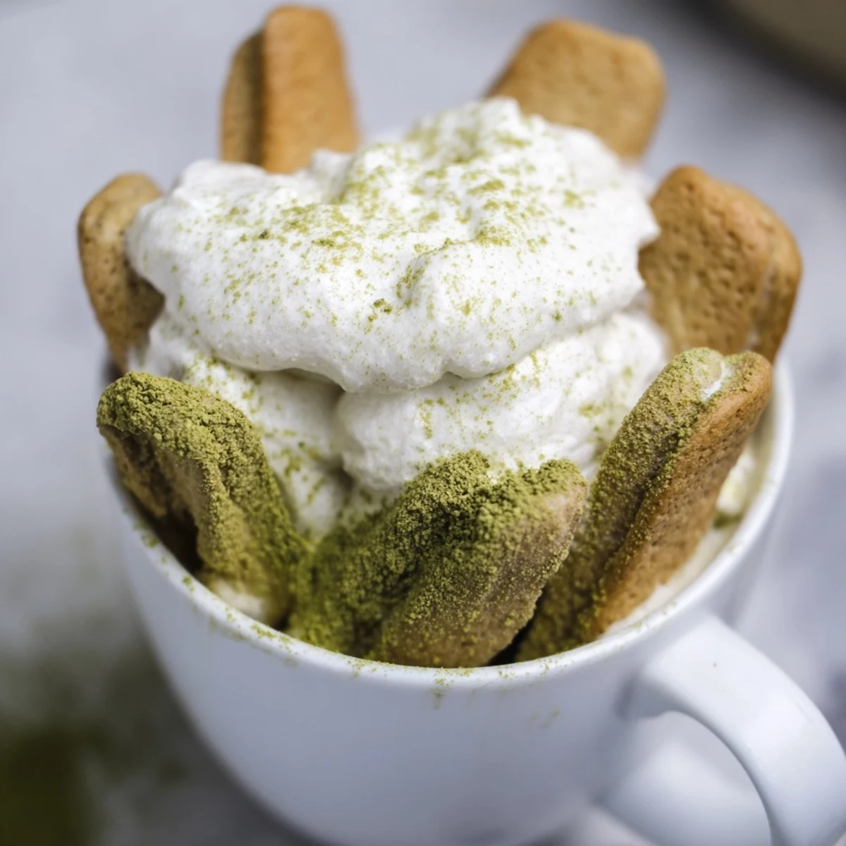 Creamy Matcha Mascarpone Tiramisu Snow Cups: a beautiful dessert, layered with matcha and mascarpone.