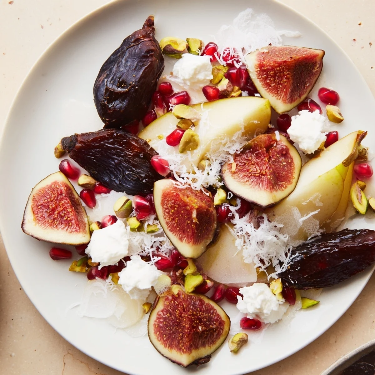 Beautiful Winter Fruit: fig and date snowdrift platter, a delightful appetizer with vibrant colors.