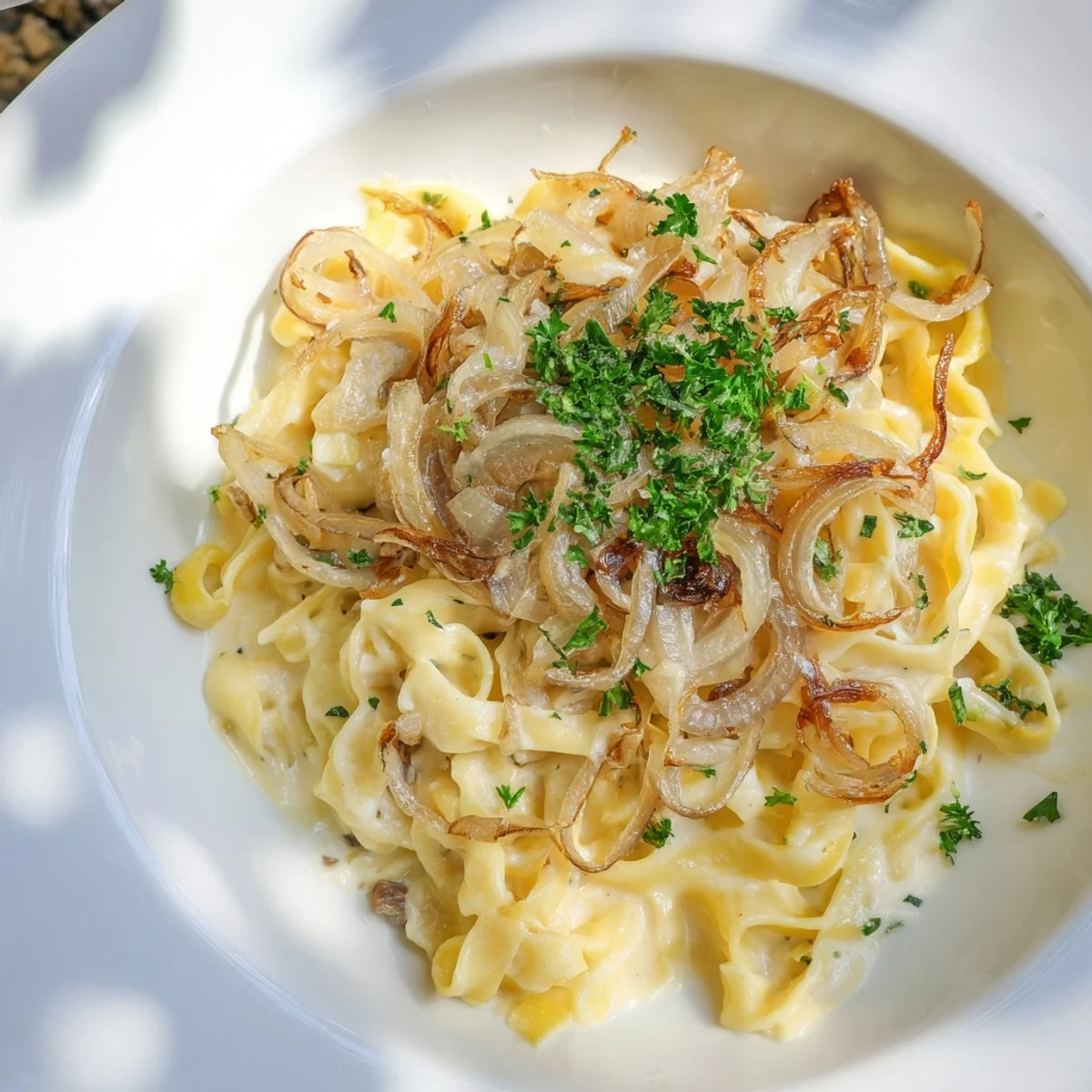 Golden, bubbling One-Pot French Onion Pasta, topped with melted Gruyère, a comforting one-pot meal idea.