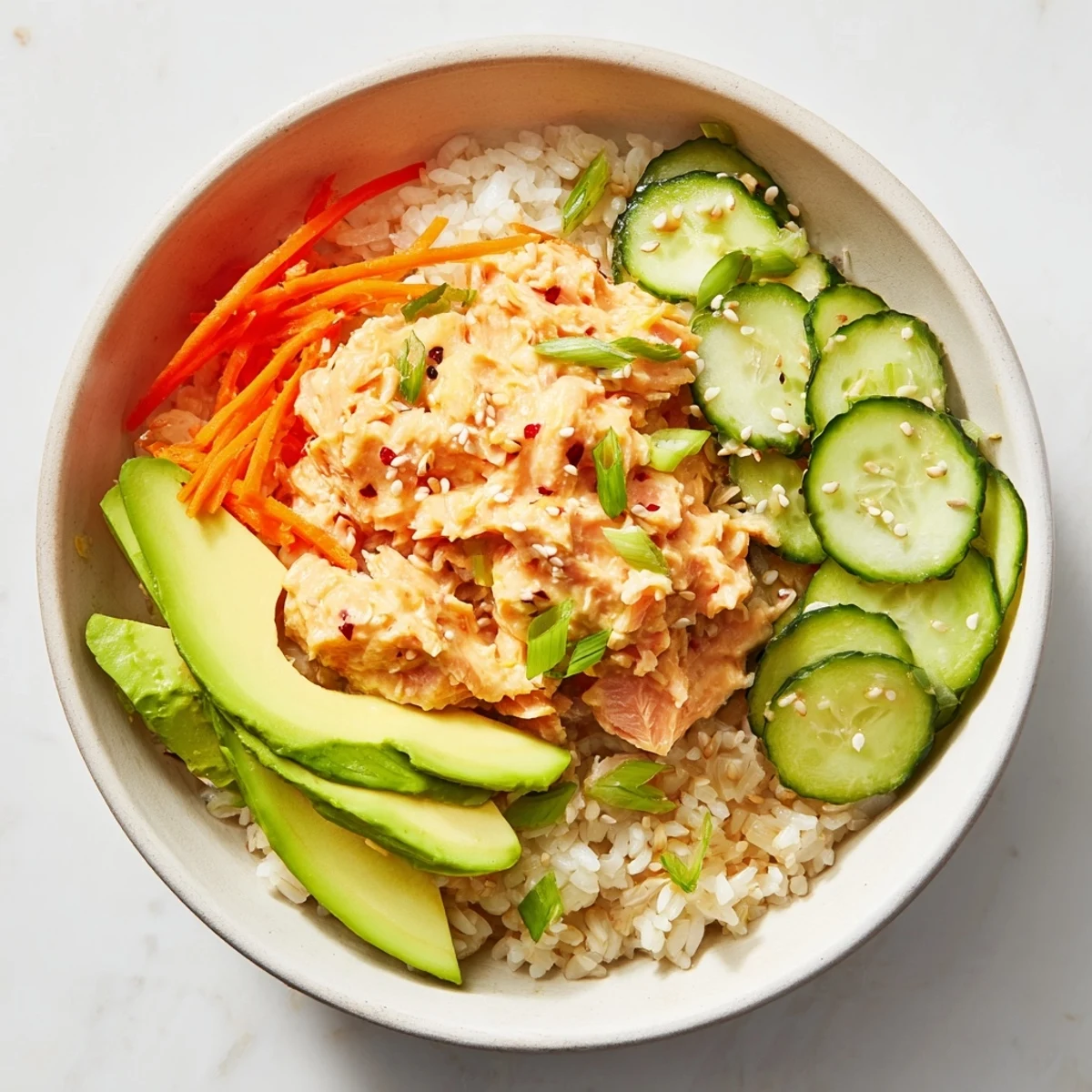 Delicious and quick, this Spicy Canned Salmon Rice Bowl is a perfect lunch or dinner option.