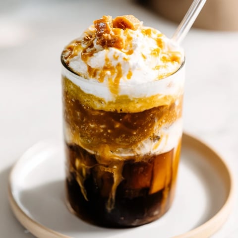 Iced Caramel Brulée Matcha Christmas Coffee Dupe, a layered, refreshing coffee drink bursting with holiday cheer.