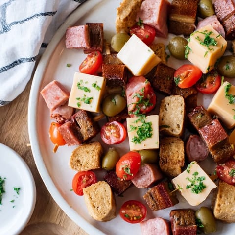 Vibrant Savory Skewers showcasing cubed ham, cheddar, and tangy pickles, ready to enjoy at any gathering.