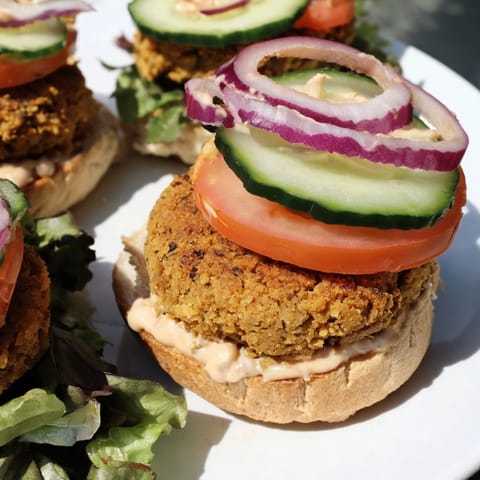 Close-up of fluffy baked falafel patties inside mini slider buns, perfect recipe for a quick lunch.